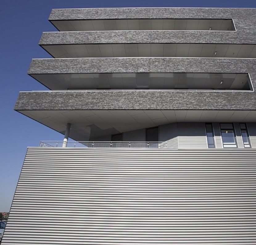 Facade of a modern building with cantilevered floors